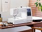 Швейно-вышивальная машина Janome Memory Craft 1000 (Smoky Blue)